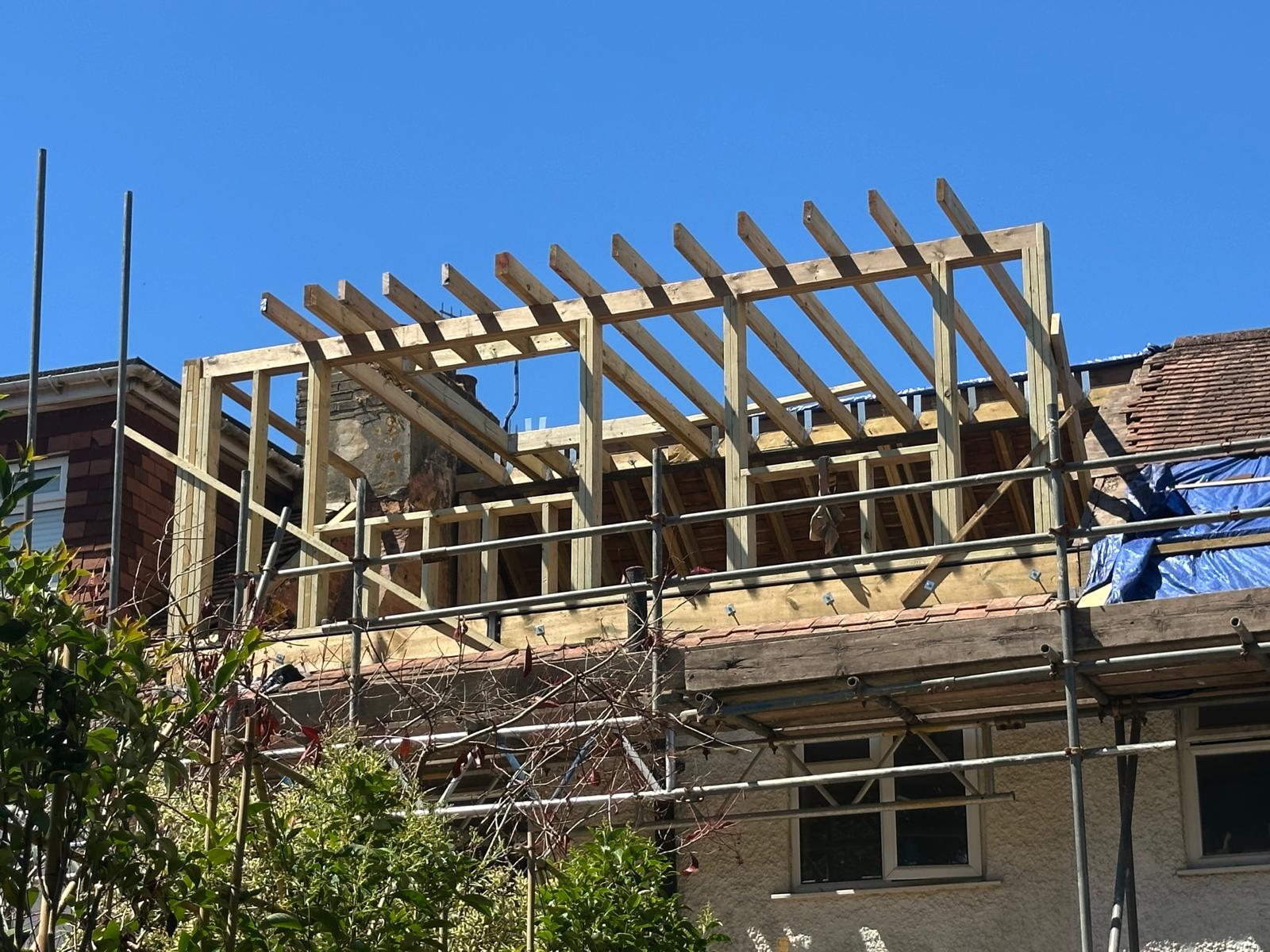 Rear extension and loft conversion during roof construction
